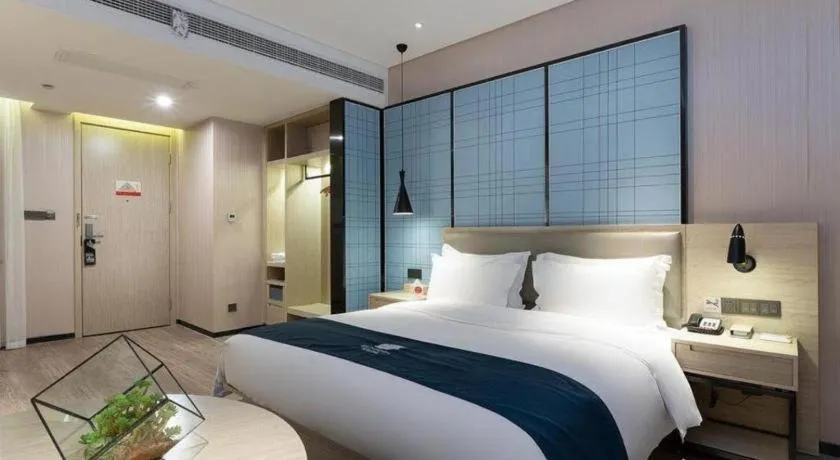 Bed in Echarm Hotel Nanning the MixC Exhibition Center Metro Station