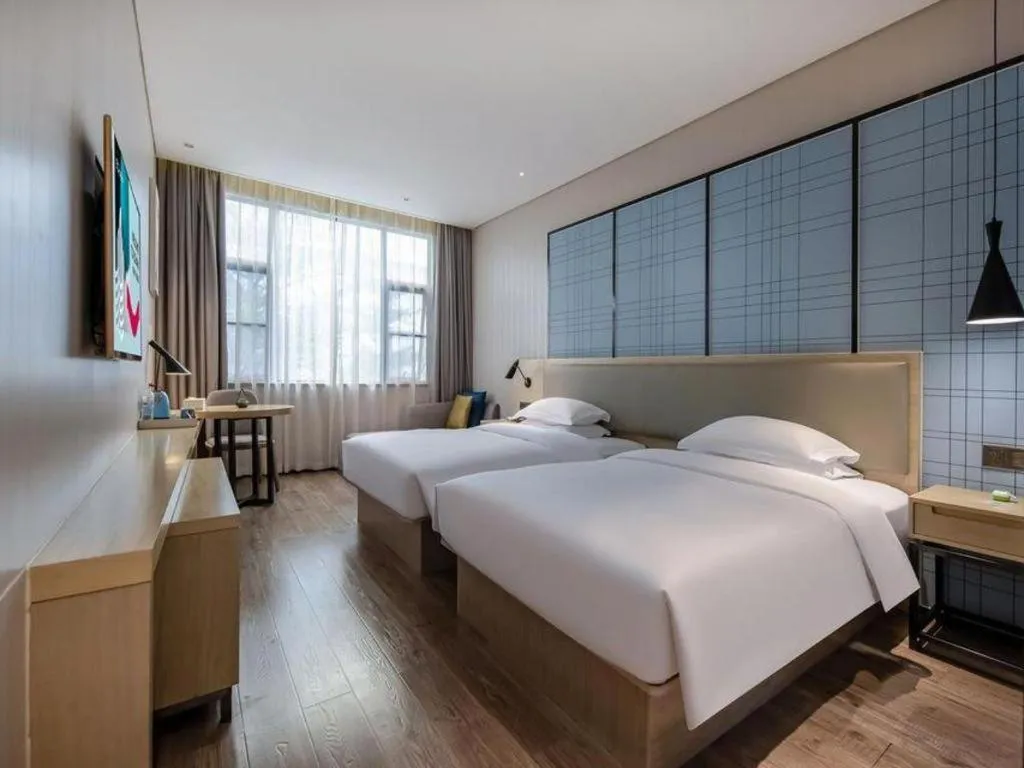 Bed in Echarm Hotel Nanning the MixC Exhibition Center Metro Station