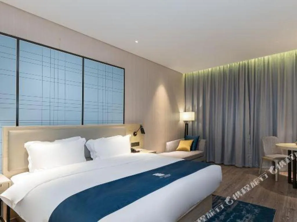 Bed in Echarm Hotel Nanning the MixC Exhibition Center Metro Station