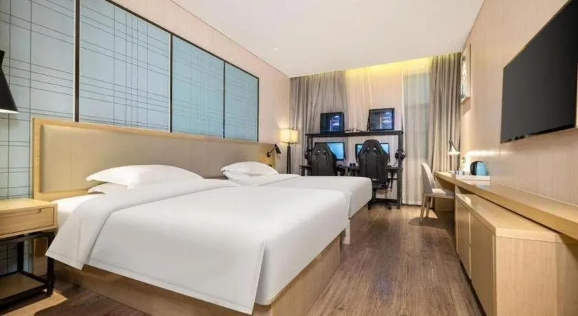 Bed in Echarm Hotel Nanning the MixC Exhibition Center Metro Station