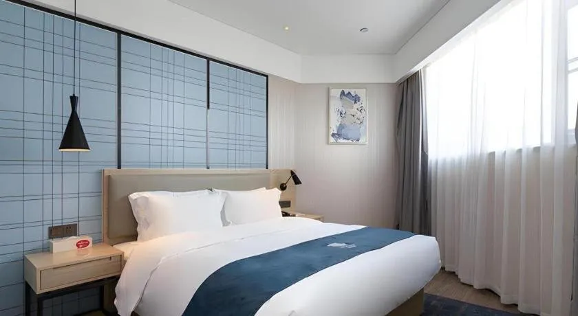 Bed in Echarm Hotel Nanning the MixC Exhibition Center Metro Station