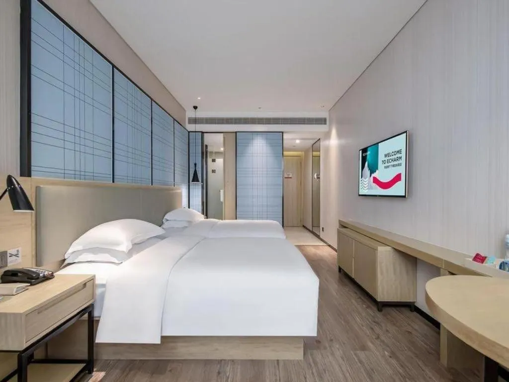 Bed in Echarm Hotel Nanning the MixC Exhibition Center Metro Station