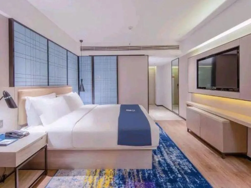 Bed in Echarm Hotel Nanning the MixC Exhibition Center Metro Station