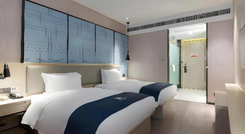 Bed in Echarm Hotel Nanning the MixC Exhibition Center Metro Station