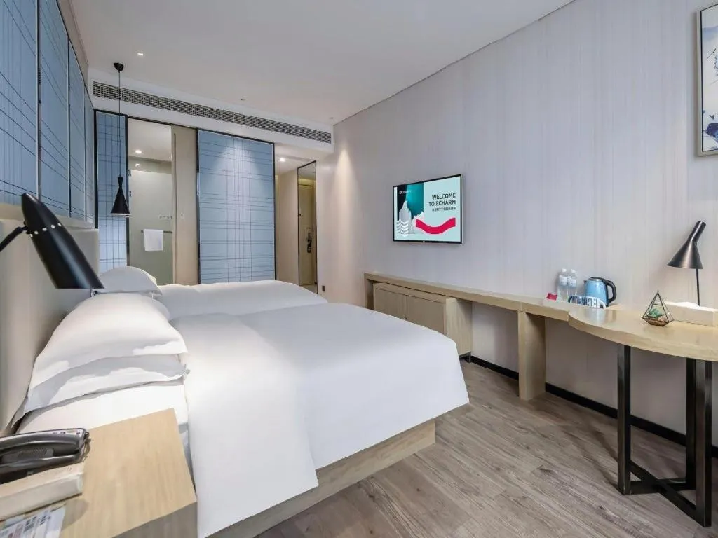 Bed in Echarm Hotel Nanning the MixC Exhibition Center Metro Station