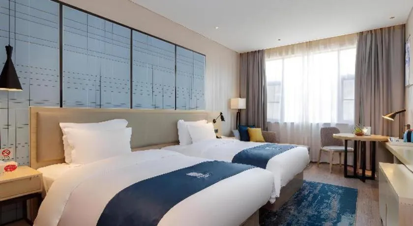 Bed in Echarm Hotel Nanning the MixC Exhibition Center Metro Station