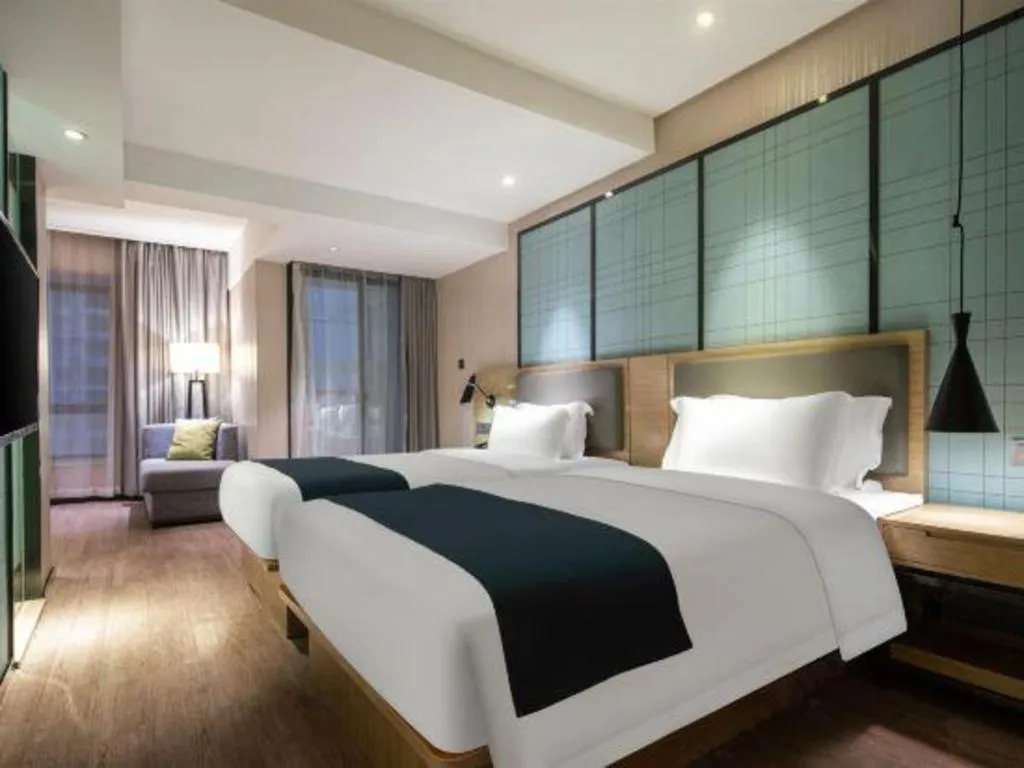 Bed in Echarm Hotel Nanning the MixC Exhibition Center Metro Station