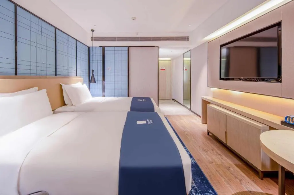 Bed in Echarm Hotel Nanning the MixC Exhibition Center Metro Station