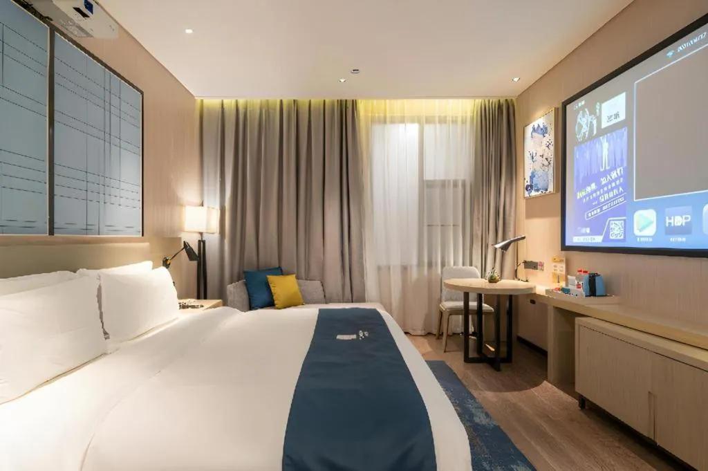 Bed in Echarm Hotel Nanning the MixC Exhibition Center Metro Station