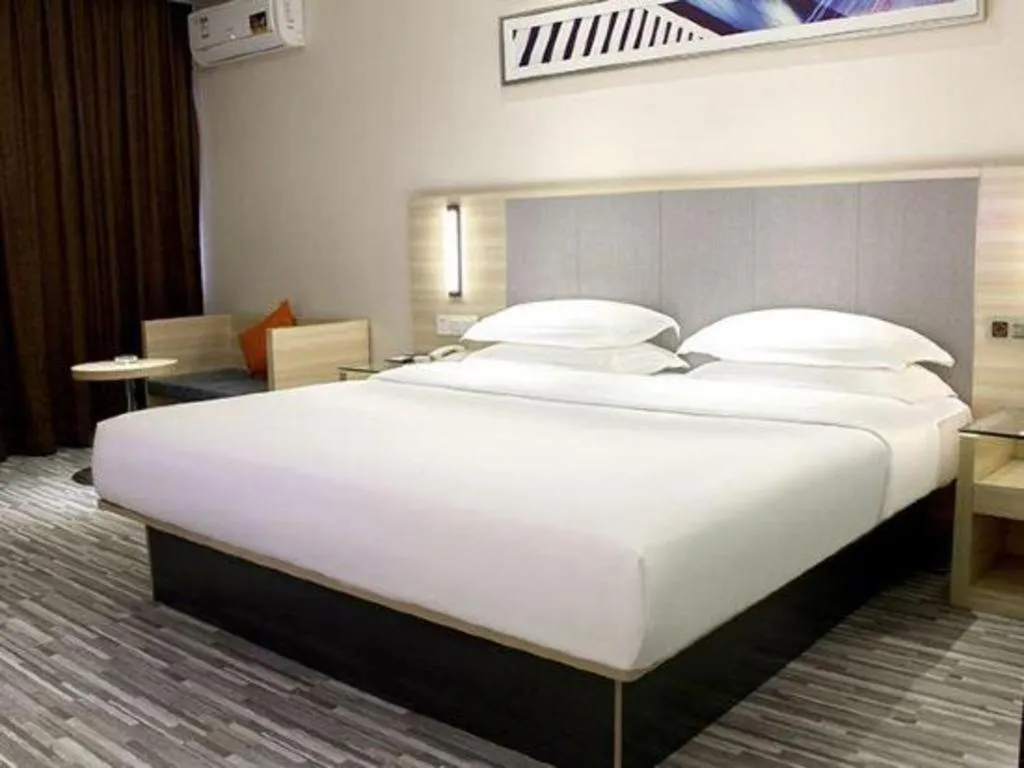 Bed in JTOUR Inn Yizhou Hechi College Pedestrian Street