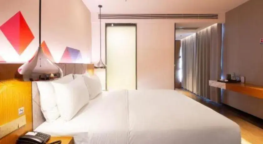 Bed in Borrman Hotel Zhanjiang Xuwen Port Terminal Bed in Borrman Hotel Zhanjiang Xuwen Port Terminal