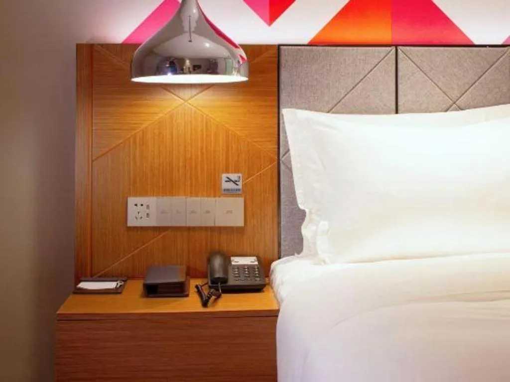 Bed in Borrman Hotel Zhanjiang Xuwen Port Terminal