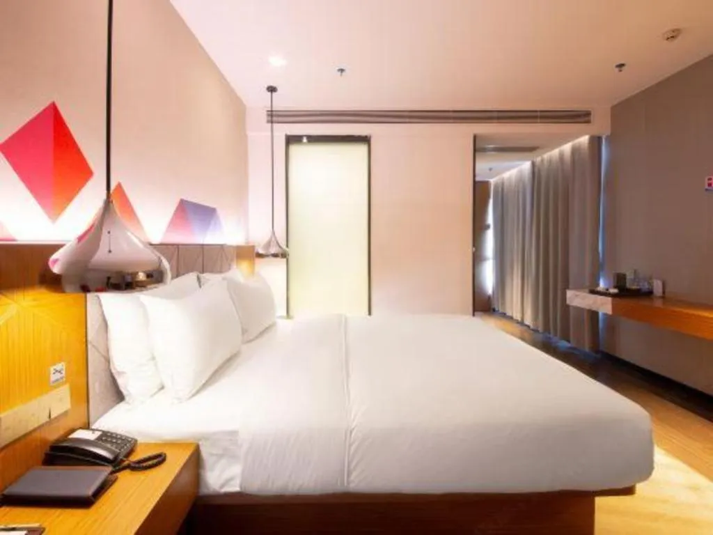 Bed in Borrman Hotel Zhanjiang Xuwen Port Terminal