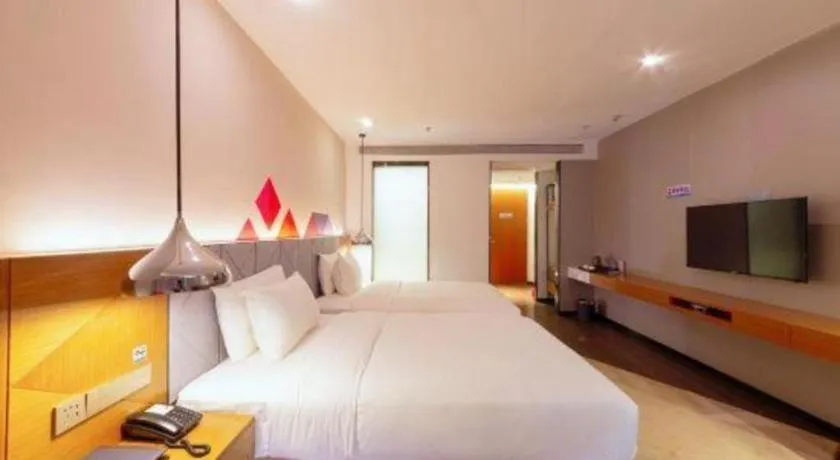 Bed in Borrman Hotel Zhanjiang Xuwen Port Terminal