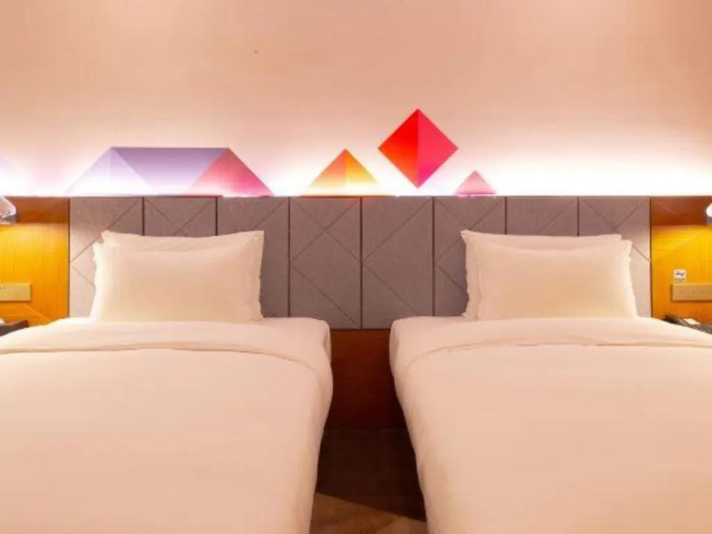 Bed in Borrman Hotel Zhanjiang Xuwen Port Terminal