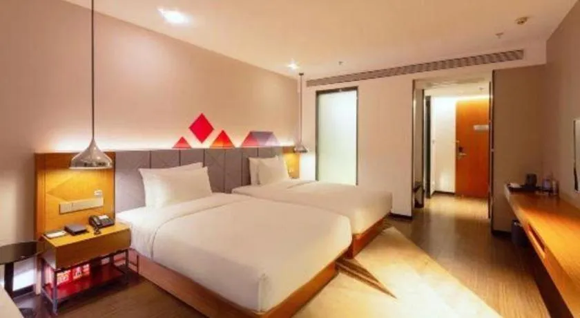 Bed in Borrman Hotel Zhanjiang Xuwen Port Terminal
