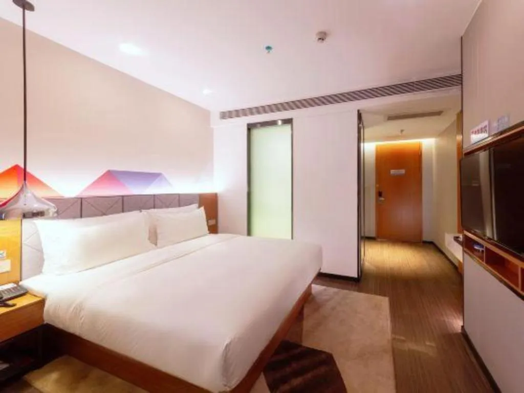 Bed in Borrman Hotel Zhanjiang Xuwen Port Terminal