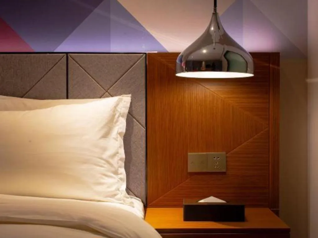 Bed in Borrman Hotel Zhanjiang Xuwen Port Terminal