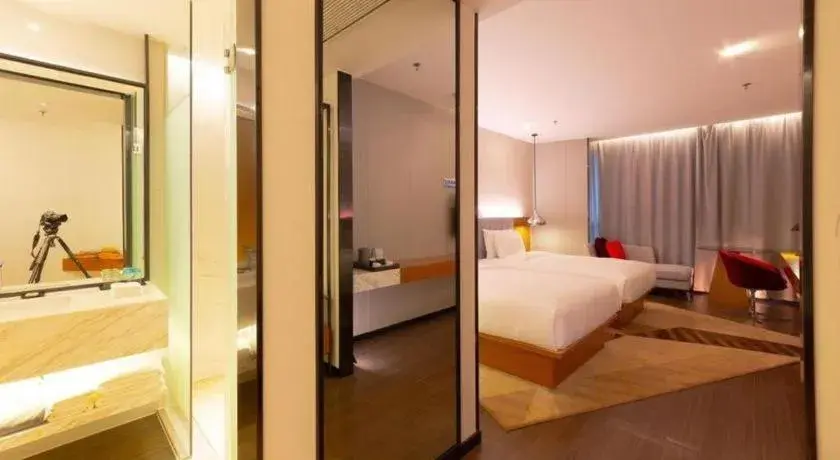 Bed in Borrman Hotel Zhanjiang Xuwen Port Terminal Bed in Borrman Hotel Zhanjiang Xuwen Port Terminal