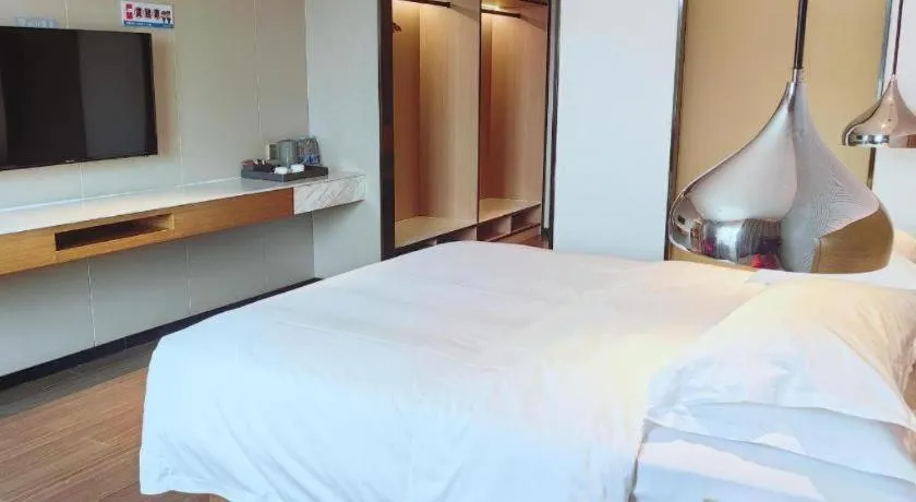 Bed in Borrman Hotel Zhanjiang Xuwen Port Terminal