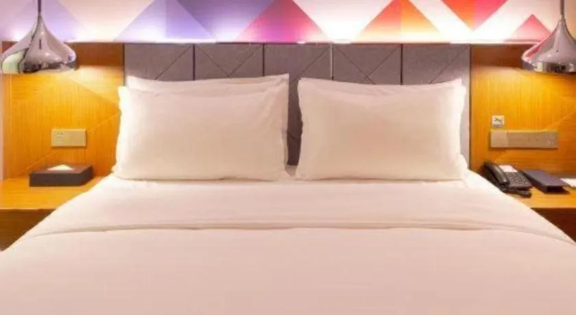 Bed in Borrman Hotel Zhanjiang Xuwen Port Terminal