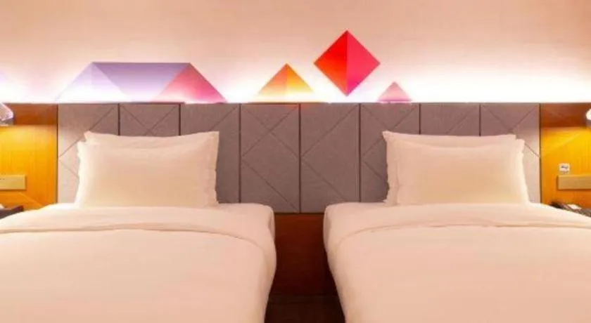 Bed in Borrman Hotel Zhanjiang Xuwen Port Terminal