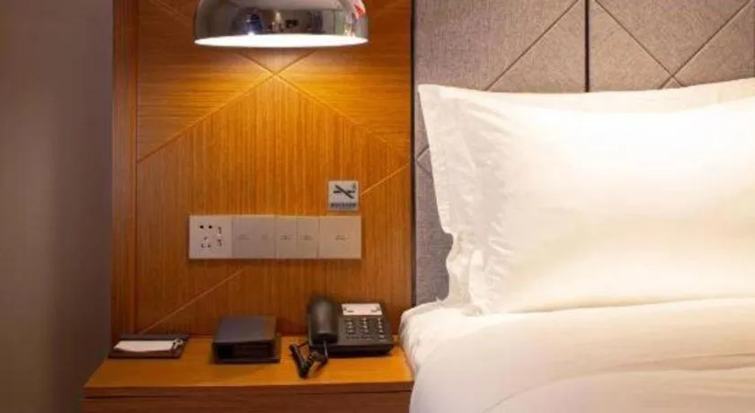 Bed in Borrman Hotel Zhanjiang Xuwen Port Terminal