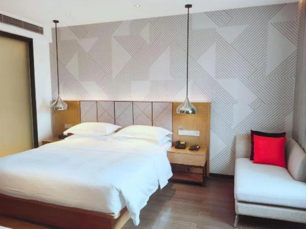 Bed in Borrman Hotel Zhanjiang Xuwen Port Terminal