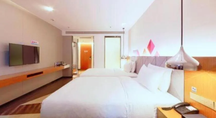 Bed in Borrman Hotel Zhanjiang Xuwen Port Terminal