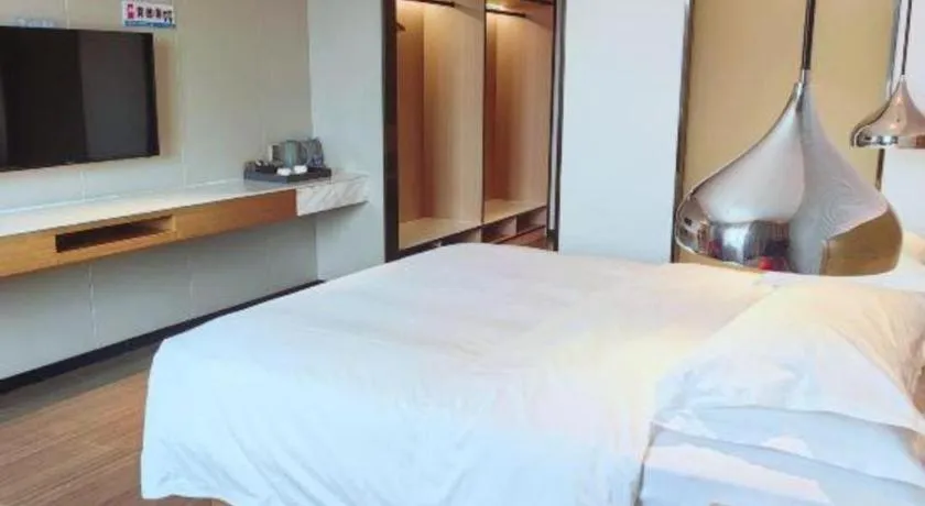 Bed in Borrman Hotel Zhanjiang Xuwen Port Terminal
