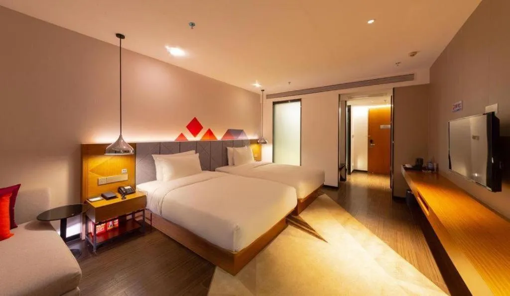 Bed in Borrman Hotel Zhanjiang Xuwen Port Terminal