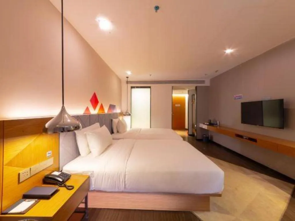 Bed in Borrman Hotel Zhanjiang Xuwen Port Terminal