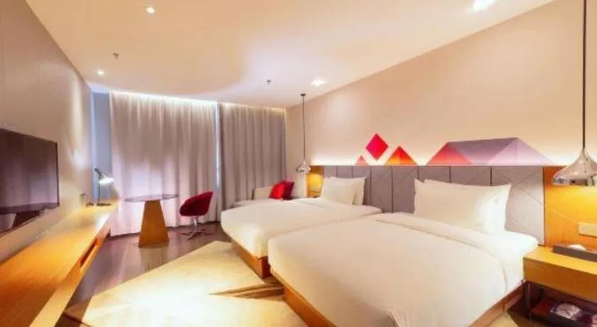 Bed in Borrman Hotel Zhanjiang Xuwen Port Terminal