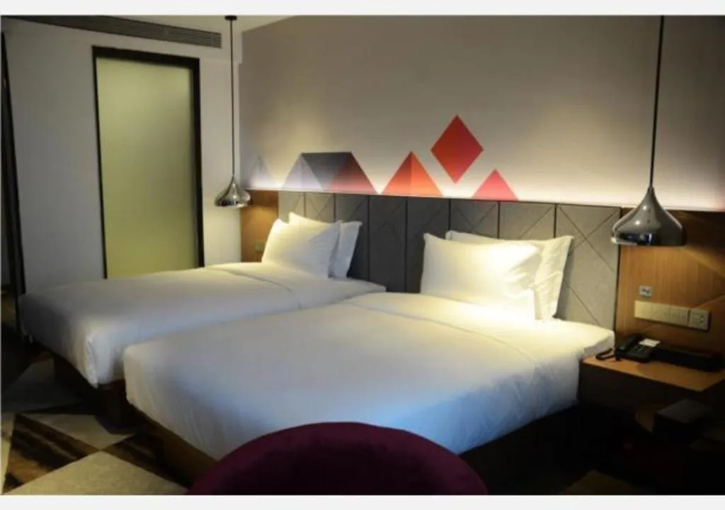 Bed in Borrman Hotel Zhanjiang Xuwen Port Terminal