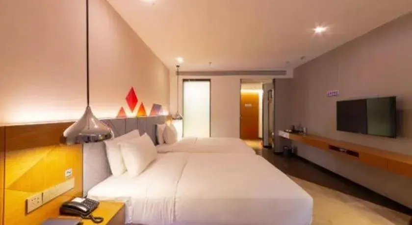 Bed in Borrman Hotel Zhanjiang Xuwen Port Terminal Bed in Borrman Hotel Zhanjiang Xuwen Port Terminal