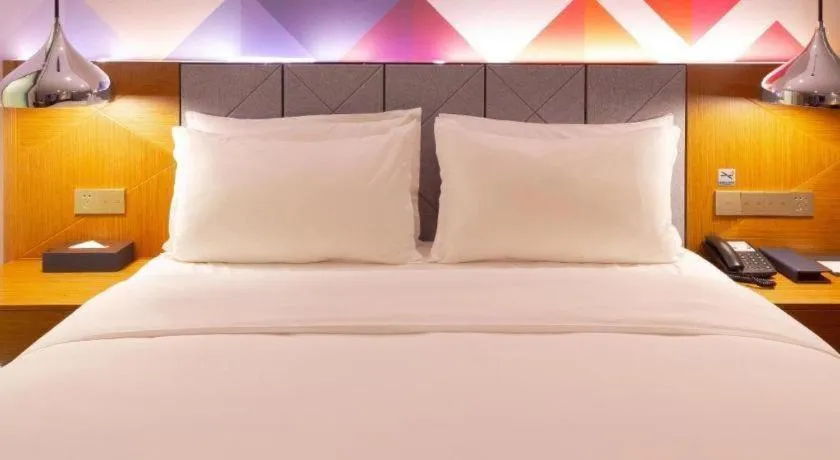 Bed in Borrman Hotel Zhanjiang Xuwen Port Terminal