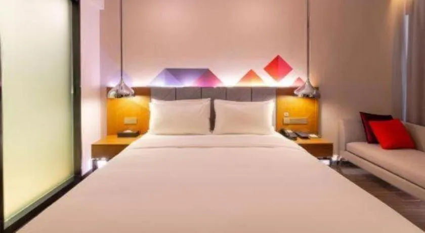 Bed in Borrman Hotel Zhanjiang Xuwen Port Terminal