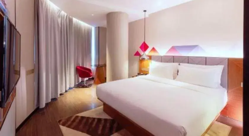 Bed in Borrman Hotel Zhanjiang Xuwen Port Terminal Bed in Borrman Hotel Zhanjiang Xuwen Port Terminal