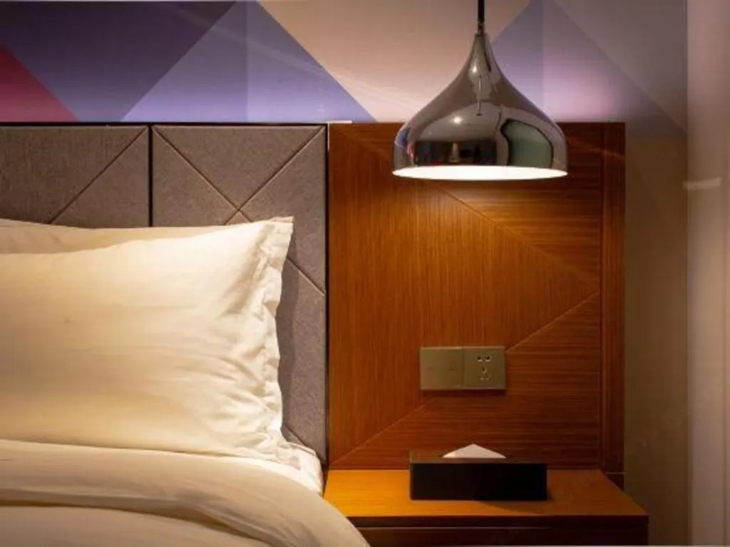 Bed in Borrman Hotel Zhanjiang Xuwen Port Terminal