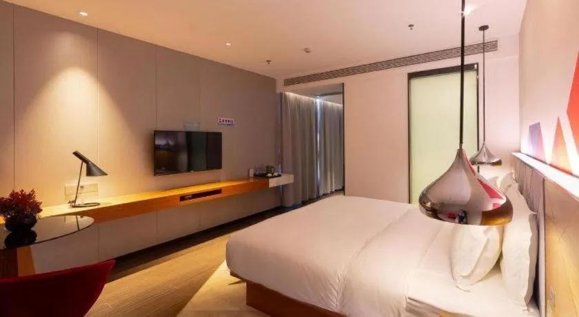 Bed in Borrman Hotel Zhanjiang Xuwen Port Terminal