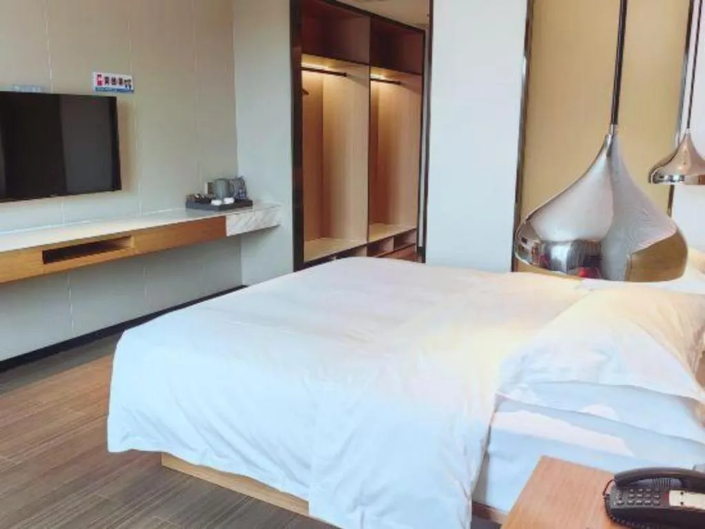 Bed in Borrman Hotel Zhanjiang Xuwen Port Terminal