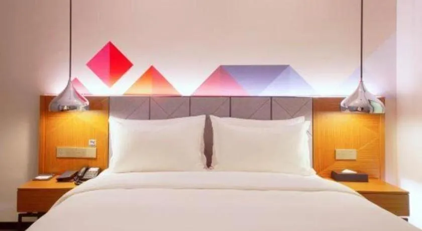 Bed in Borrman Hotel Zhanjiang Xuwen Port Terminal