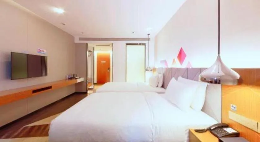 Bed in Borrman Hotel Zhanjiang Xuwen Port Terminal