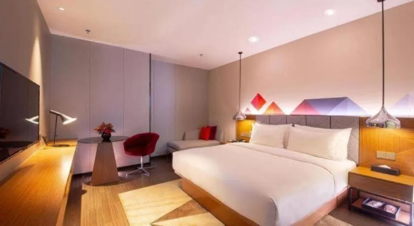 Bed in Borrman Hotel Zhanjiang Xuwen Port Terminal