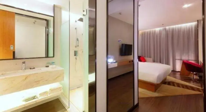 Bed in Borrman Hotel Zhanjiang Xuwen Port Terminal Bed in Borrman Hotel Zhanjiang Xuwen Port Terminal