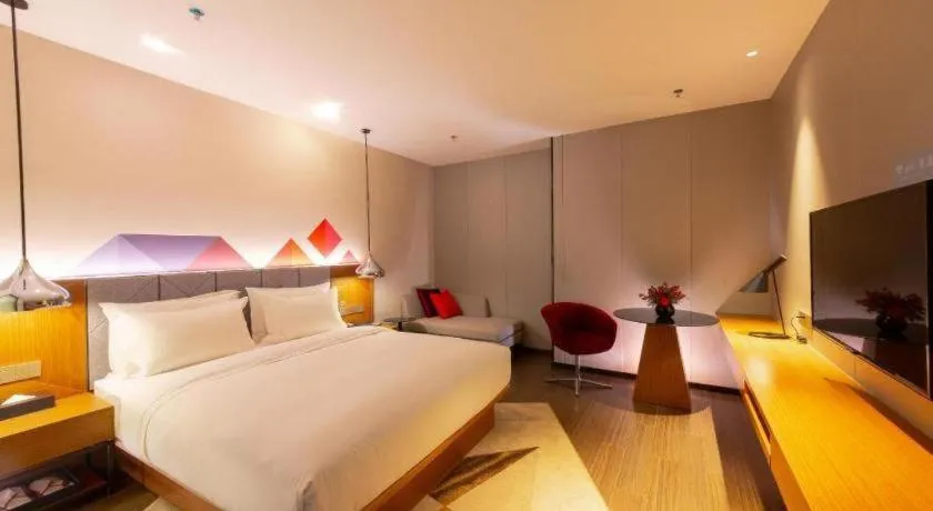 Bed in Borrman Hotel Zhanjiang Xuwen Port Terminal