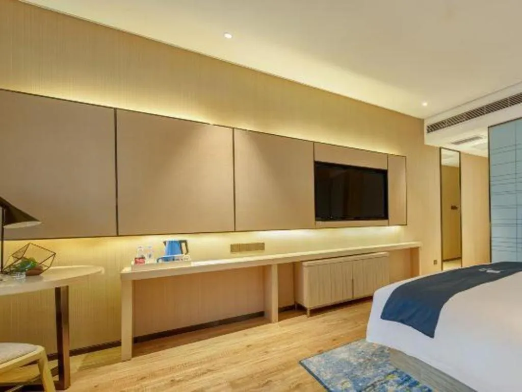 Bed in Echarm Hotel Liuzhou High-speed Railway Station