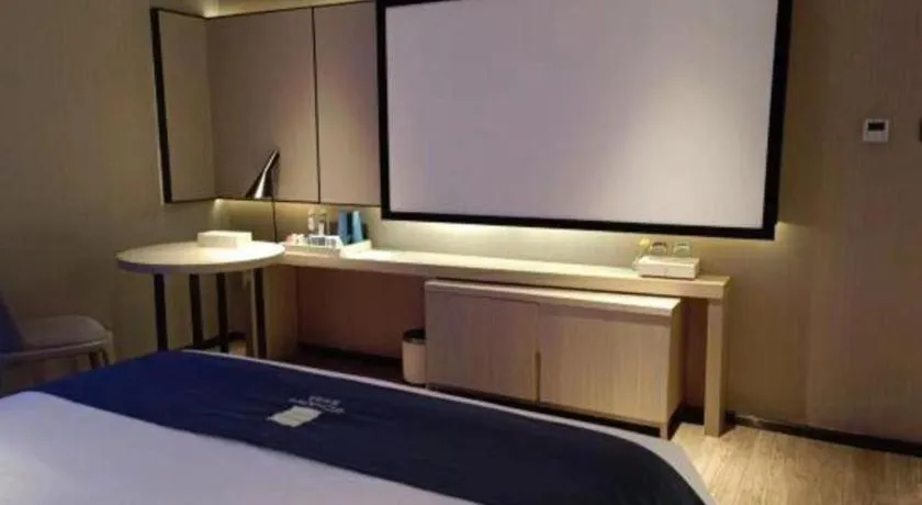 Bed in Echarm Hotel Liuzhou High-speed Railway Station