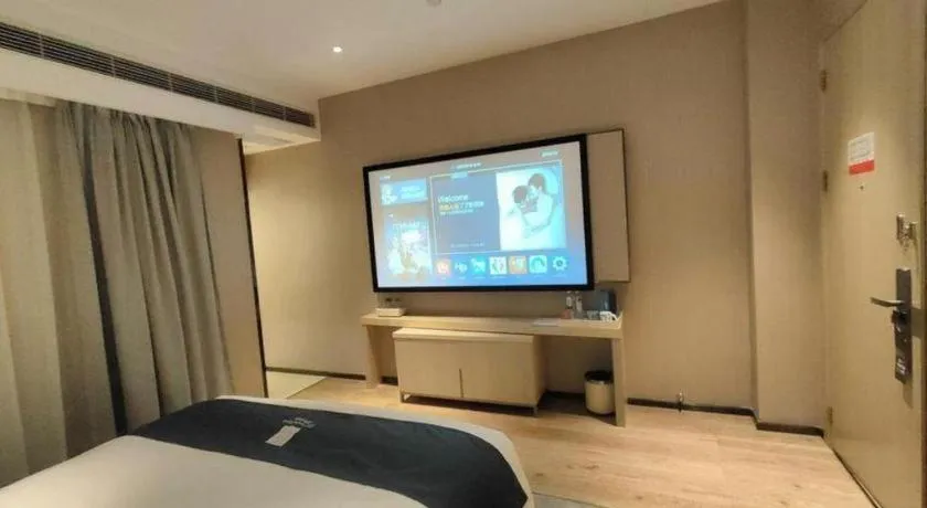 Bed in Echarm Hotel Liuzhou High-speed Railway Station