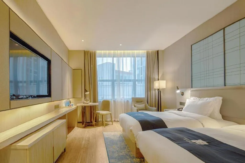 Bed in Echarm Hotel Liuzhou High-speed Railway Station